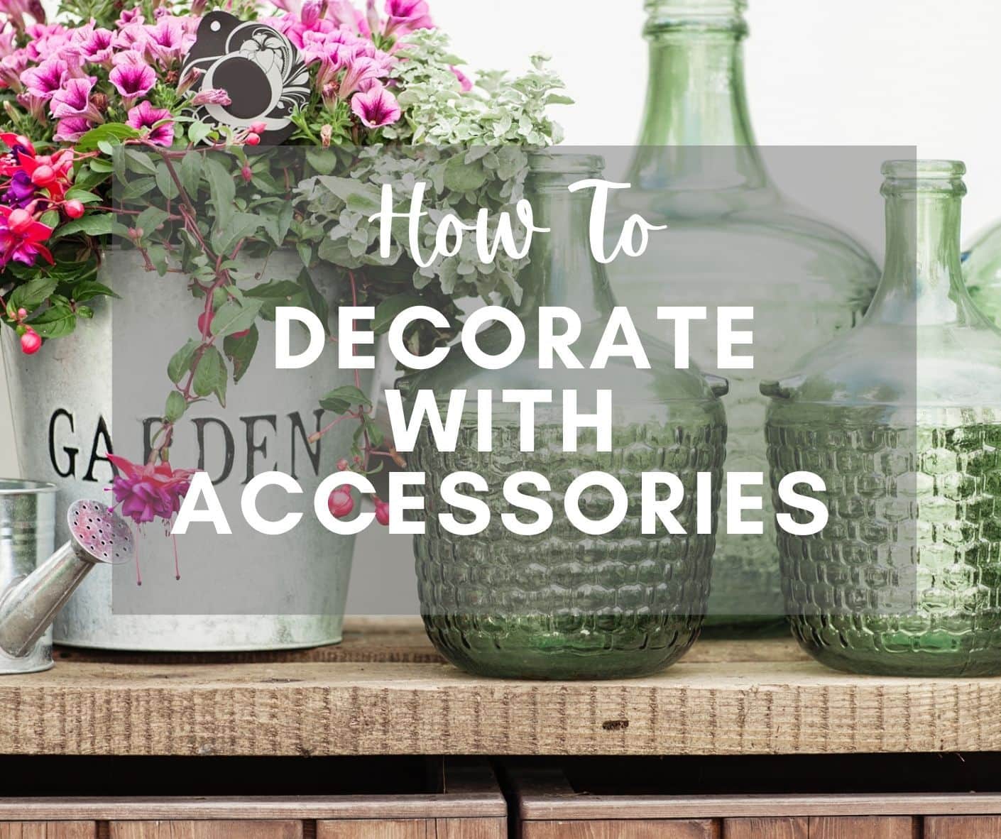How to decorate with accessories - green glass bottles with white garden bucket with flowers