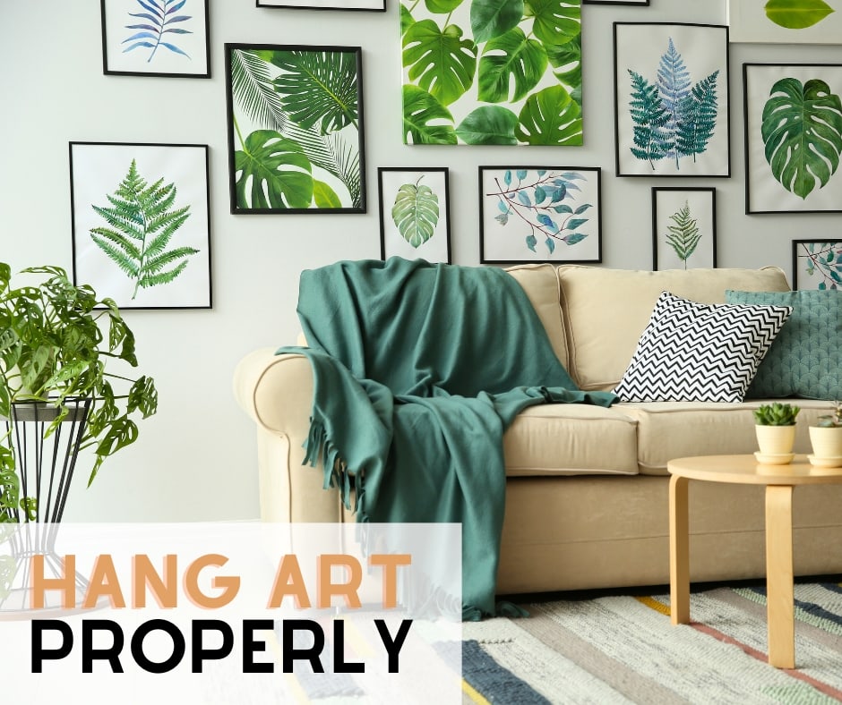 interior design mistakes - hanging artwork properly