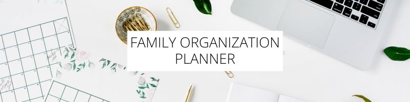 family organization planner on a desk with a laptop for a post about types of planners