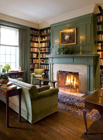green moody living room with fireplace