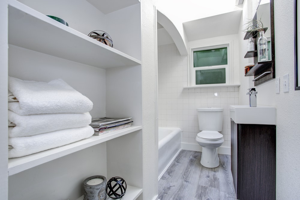 mobile home bathroom remodel with open shelving