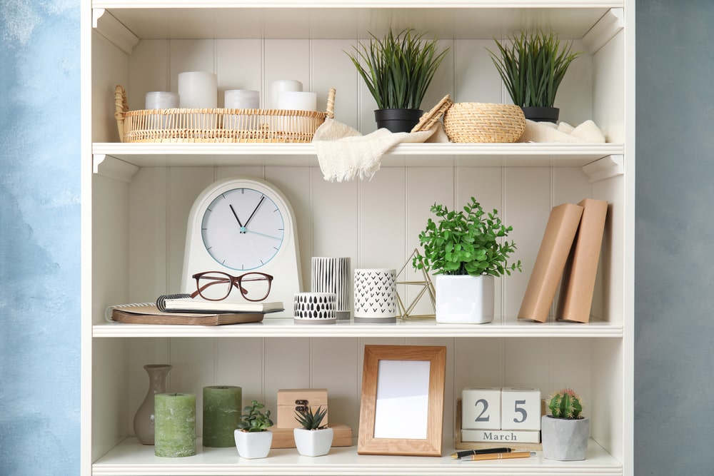 shelf with decorative items gathered in clusters