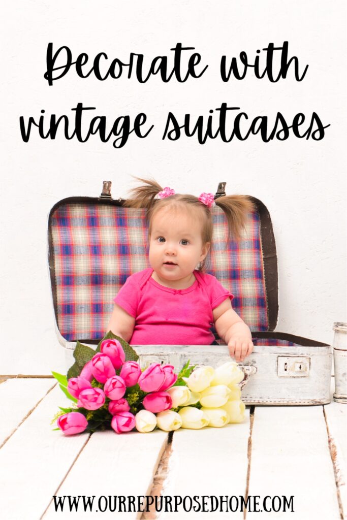 baby inside a vintage suitcase for vintage suitcase decorating ideas