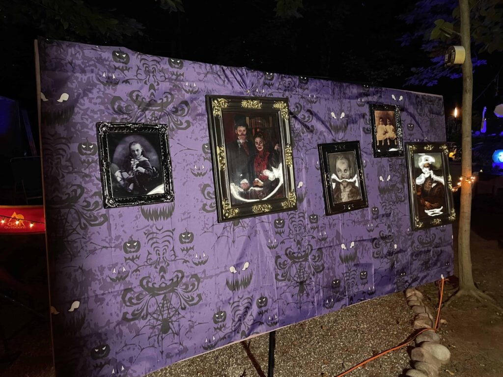 DIY Haunted Mansion wall of portraits