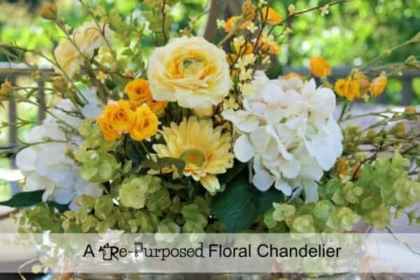 floral arrangement with yellow, green and white flowers