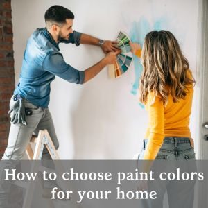 couple choosing a paint color for their wall